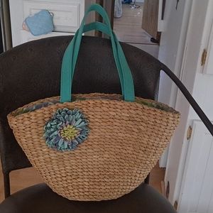 Straw purse with material inside